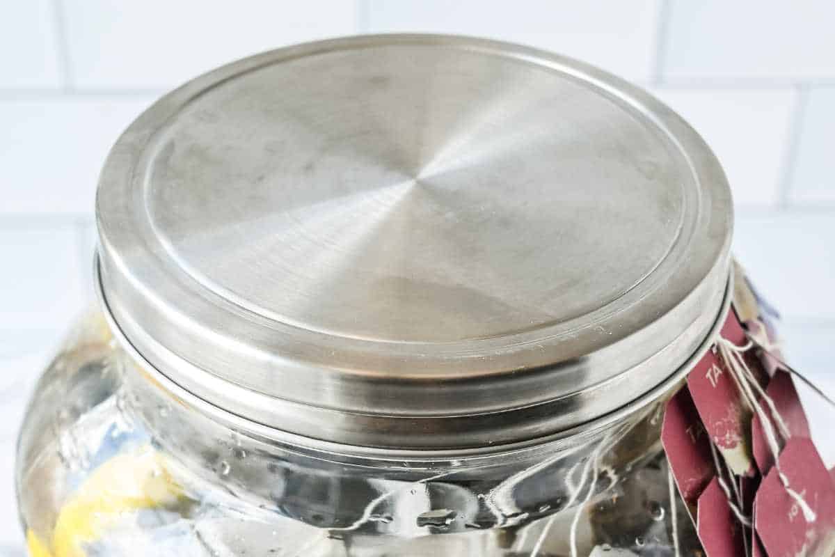 close up shot of lid covering beverage dispenser.