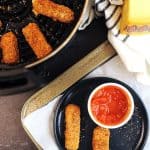 Keto cheese sticks are a low carb appetizer that is easy to make in the air fryer. Keto appetizer idea for the holidays that everyone will eat.