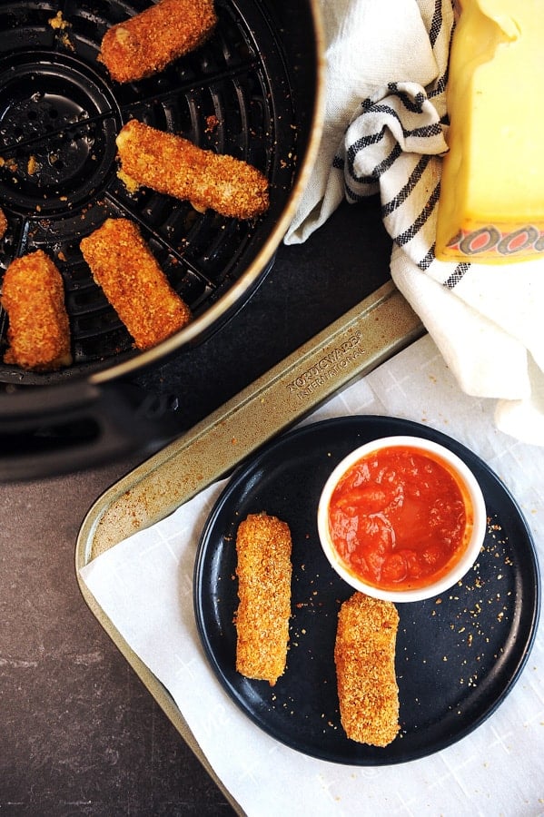 Keto cheese sticks are a low carb appetizer that is easy to make in the air fryer. Keto appetizer idea for the holidays that everyone will eat.