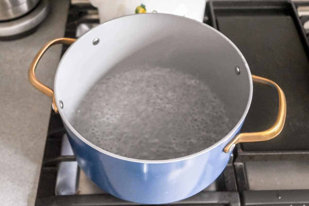 boiling water in a pot.
