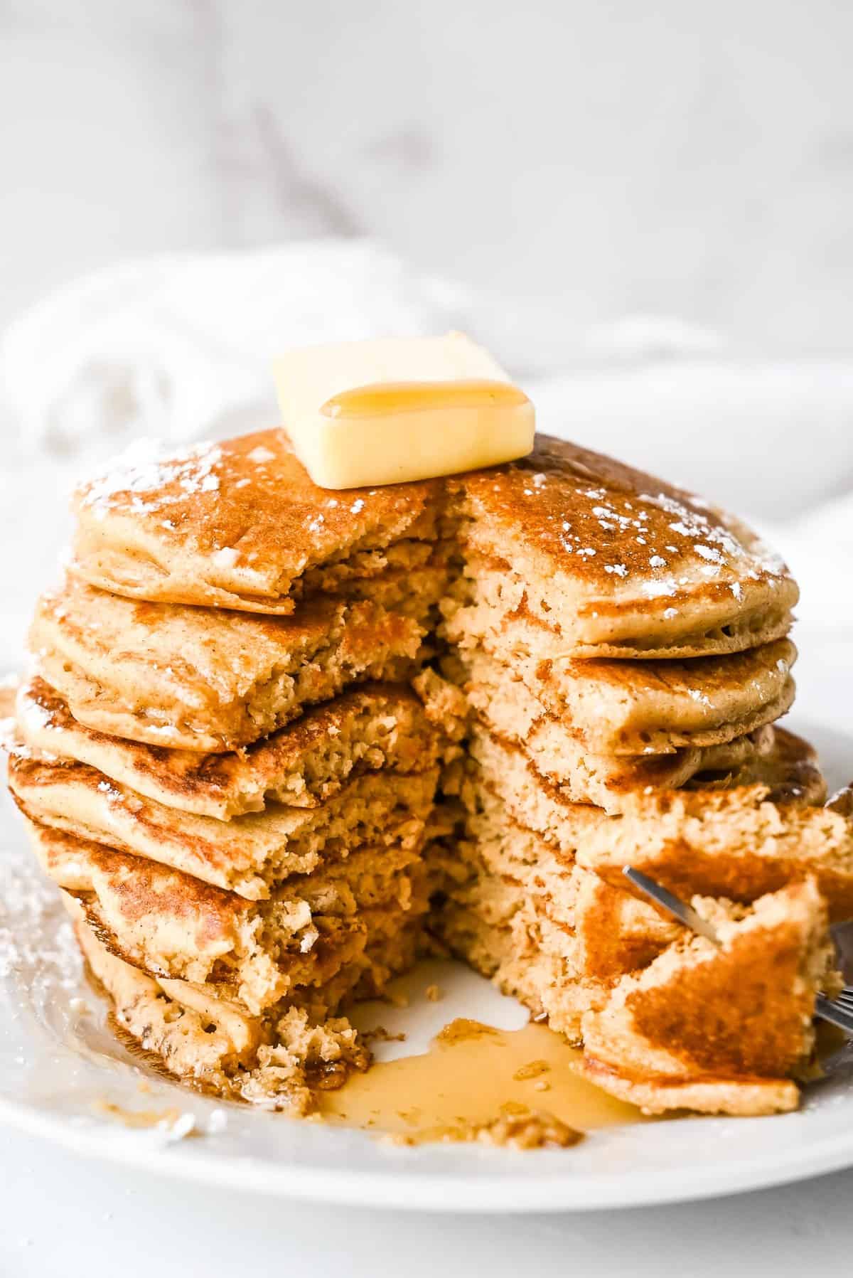 stack of pancakes with a large cut to see the inside