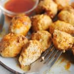 plate of buffalo chicken meatballs with a fork