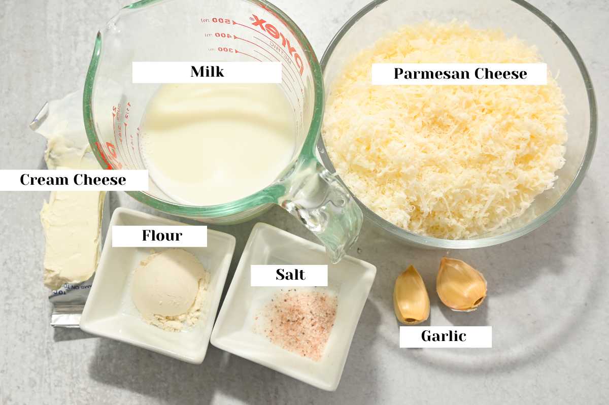 labeled ingredients for making alfredo sauce in the crockpot.