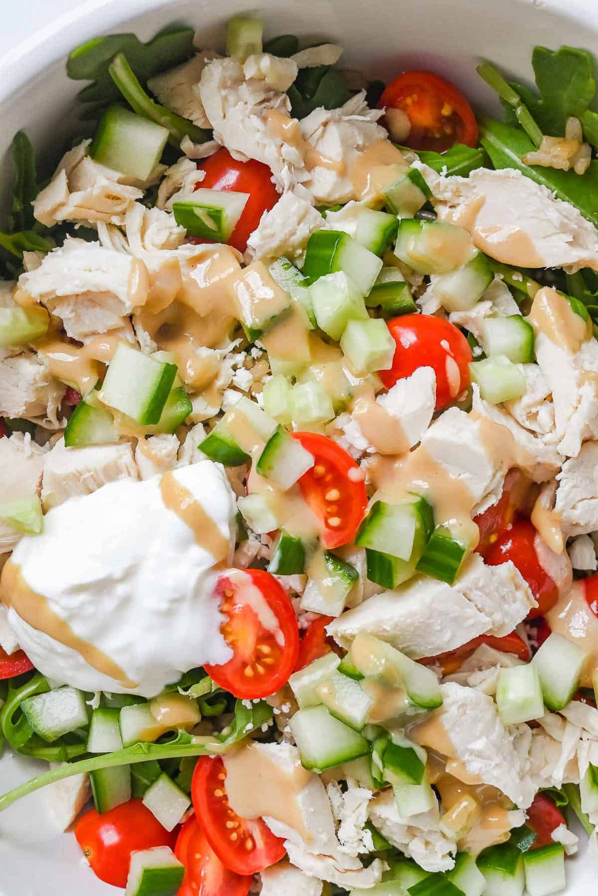 close up shot of Panera Mediterranean Bowl with lemon tahini drizzled over top.