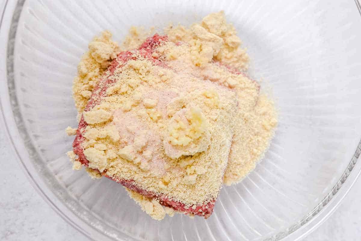 meatball ingredients in a glass bowl.