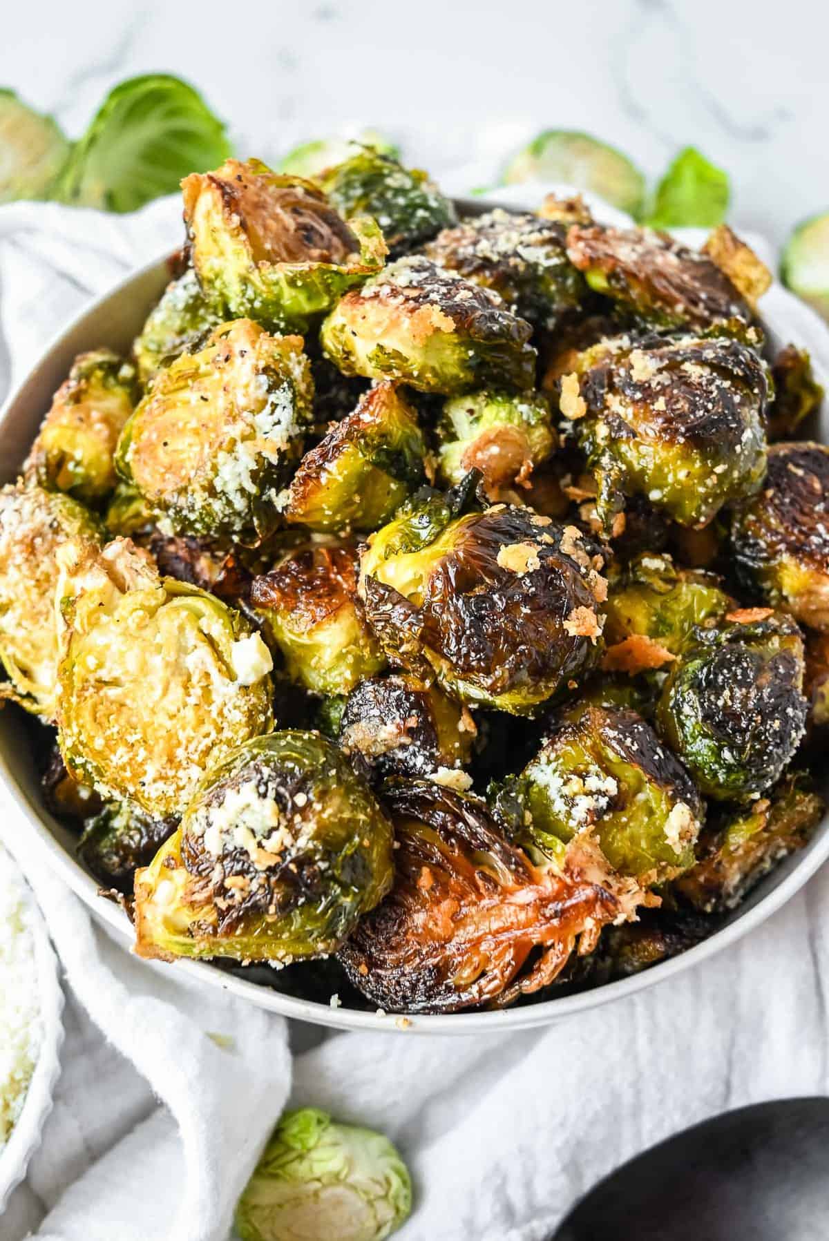 bowl of crispy garlic parmesan brussel sprouts