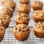 chocolate chip muffins on a cooling rack
