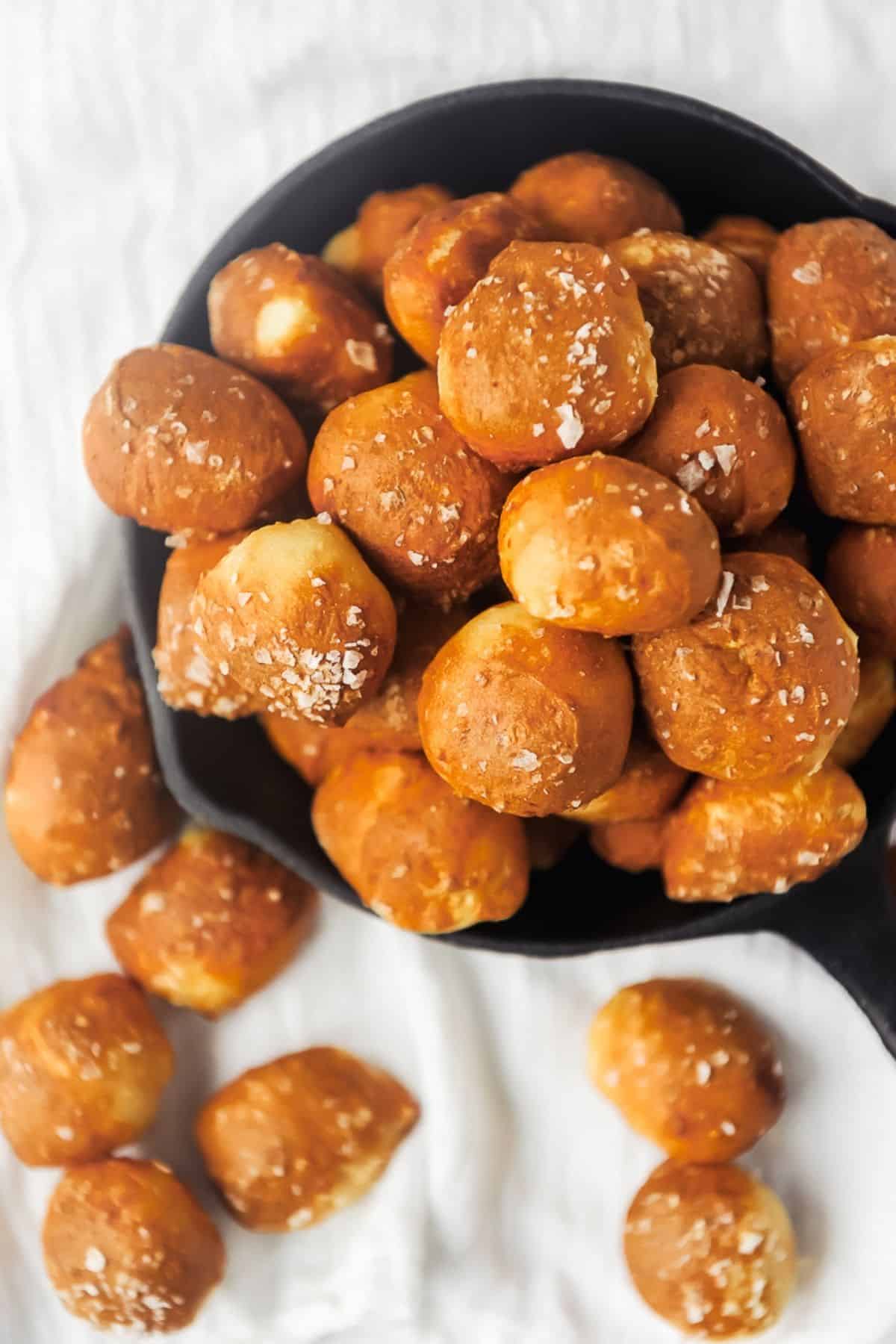 skillet of air fryer pretzel bites with salt