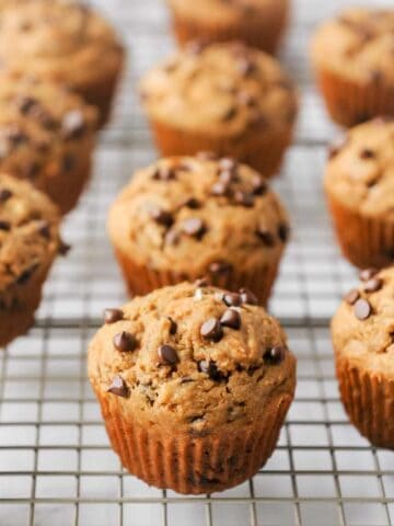 gluten-free chocolate chip muffins on a cooling rack.