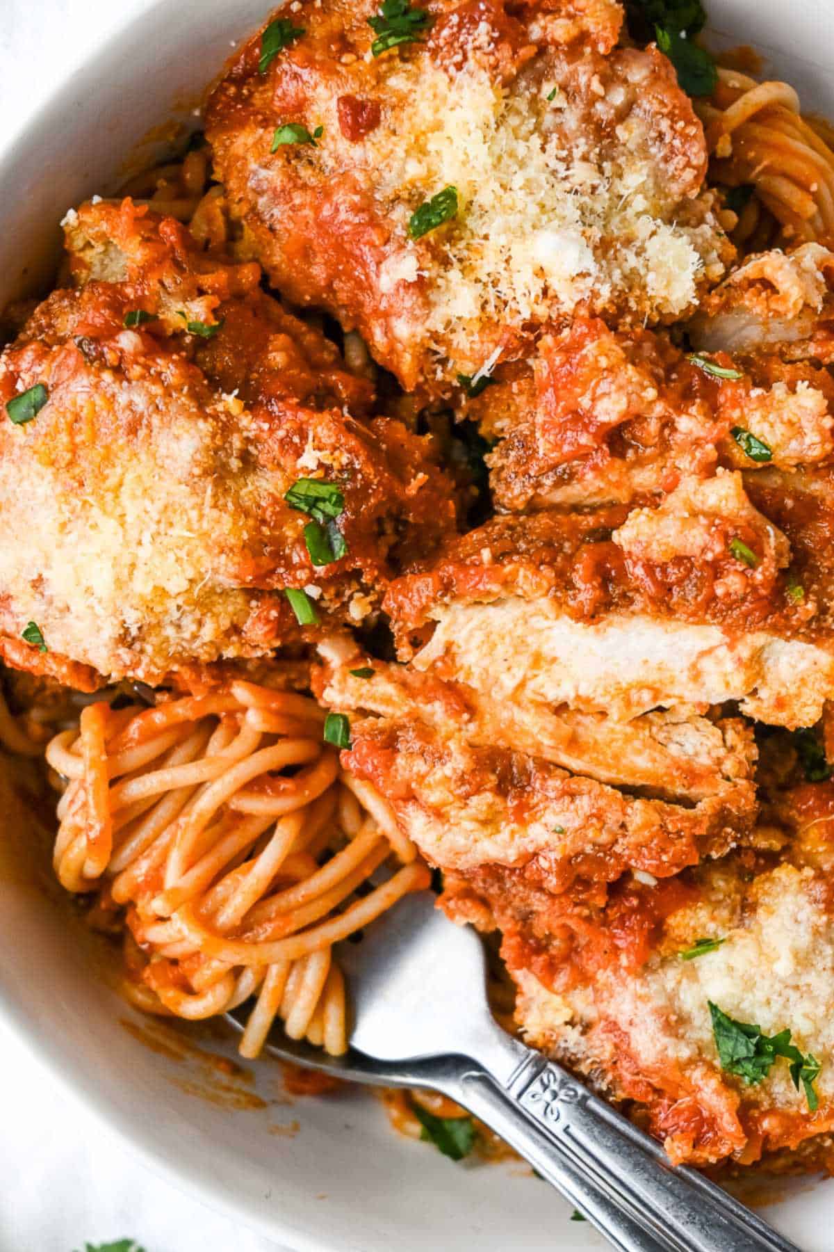 gluten free chicken parmesan with pasta.