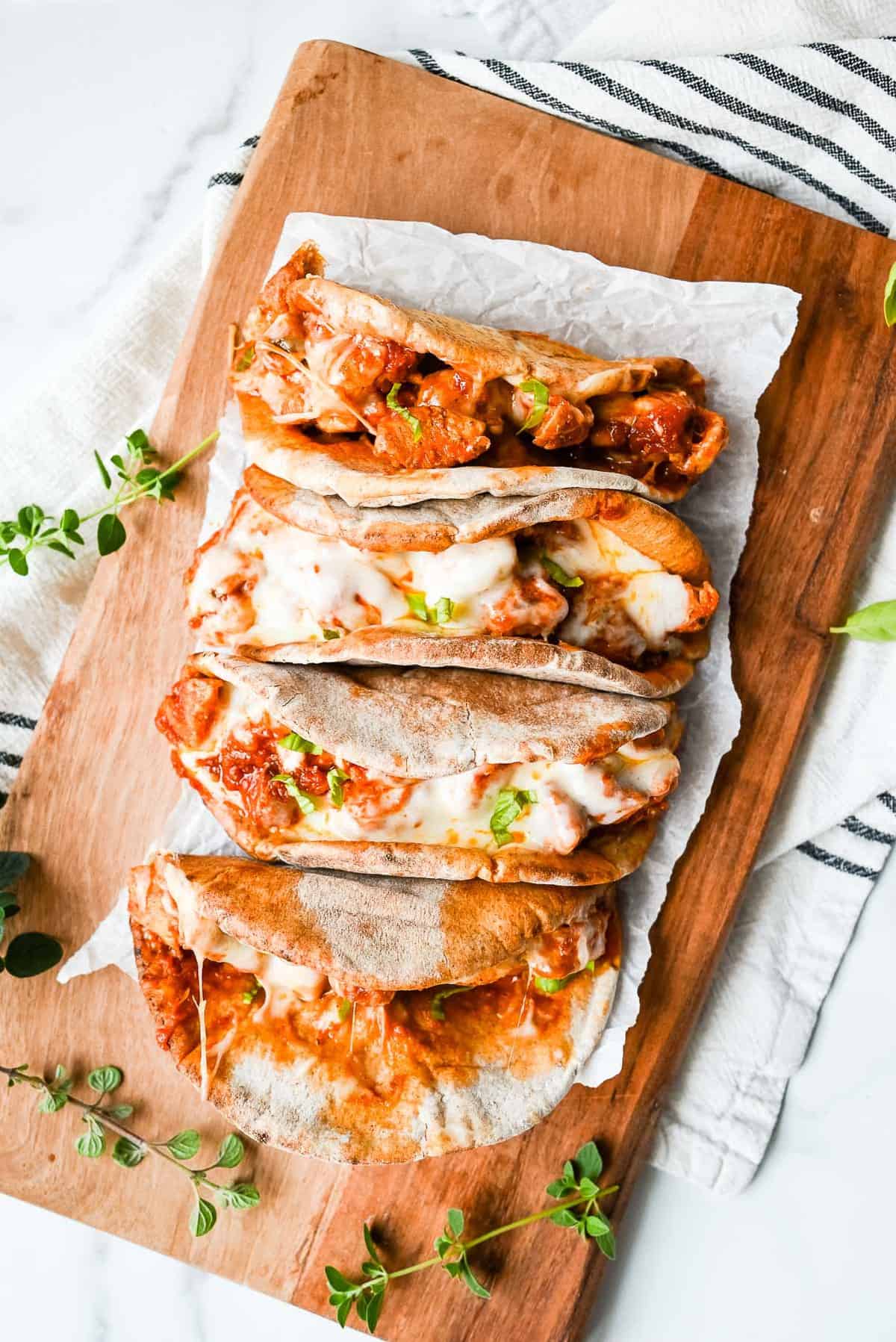 healthy instant pot chicken parmesan sandwiches on a platter