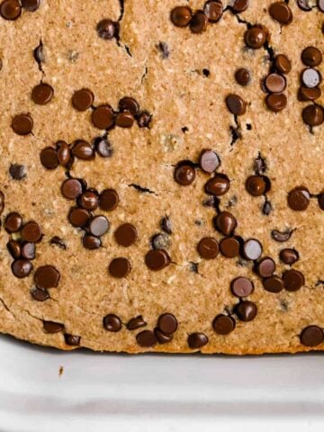 close up shot of protein baked oats in a white dish.