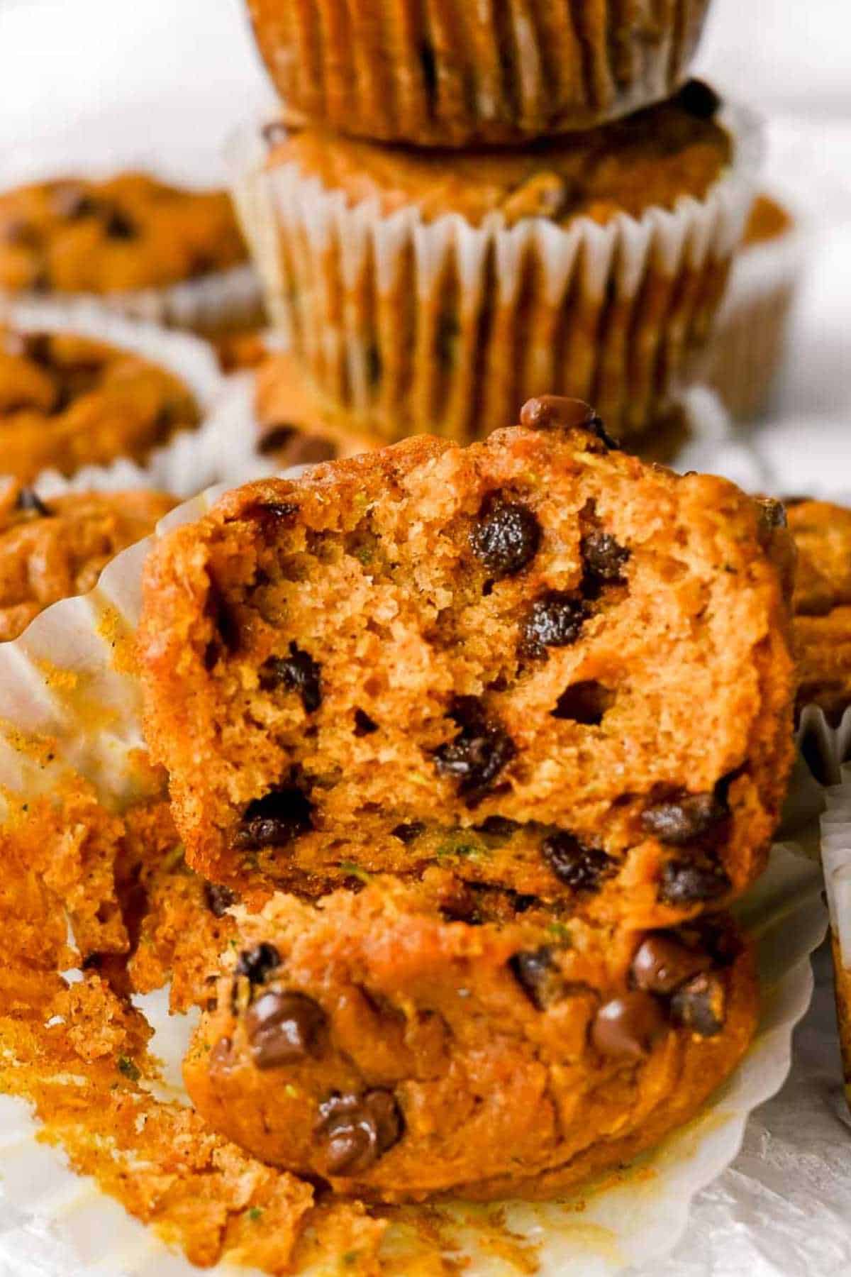 inside bite shot of a pumpkin zucchini muffin.