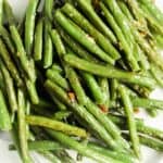 close up shot of blistered green beans.