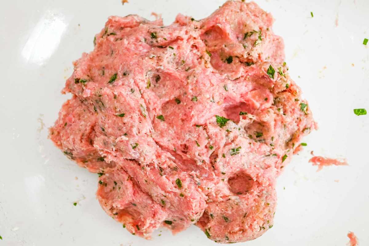 meatball mixture in a glass bowl.