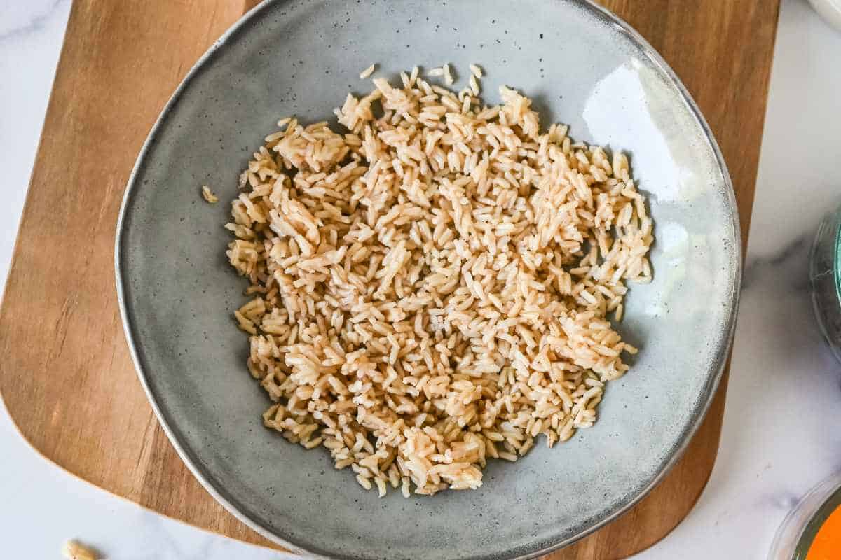 microwave brown rice in a gray bowl.