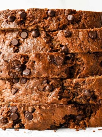 close up shot of healthy zucchini bread slices in a stack.