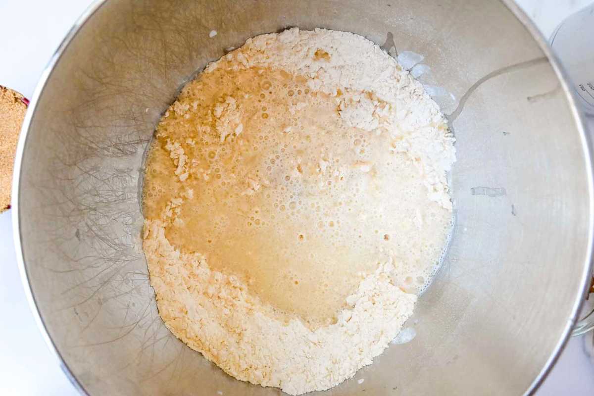 wet and dry ingredients in a silver bowl.