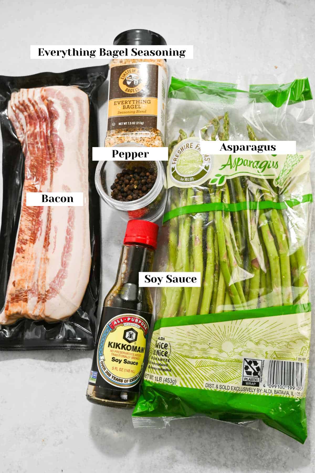 labeled ingredients for making sauteed asparagus with bacon.