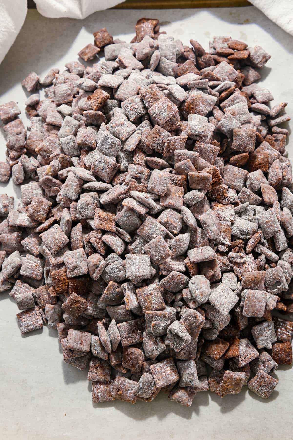 healthy muddy buddies on parchment paper.