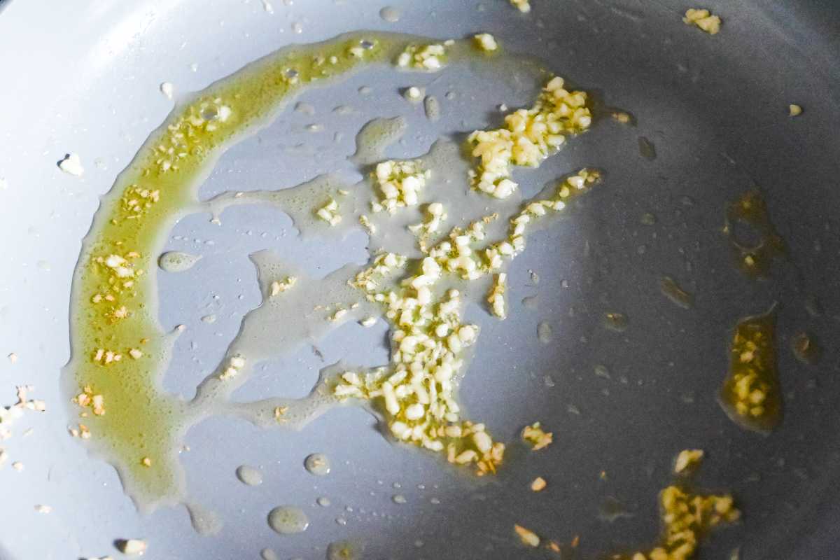 minced garlic with oil in a pan.