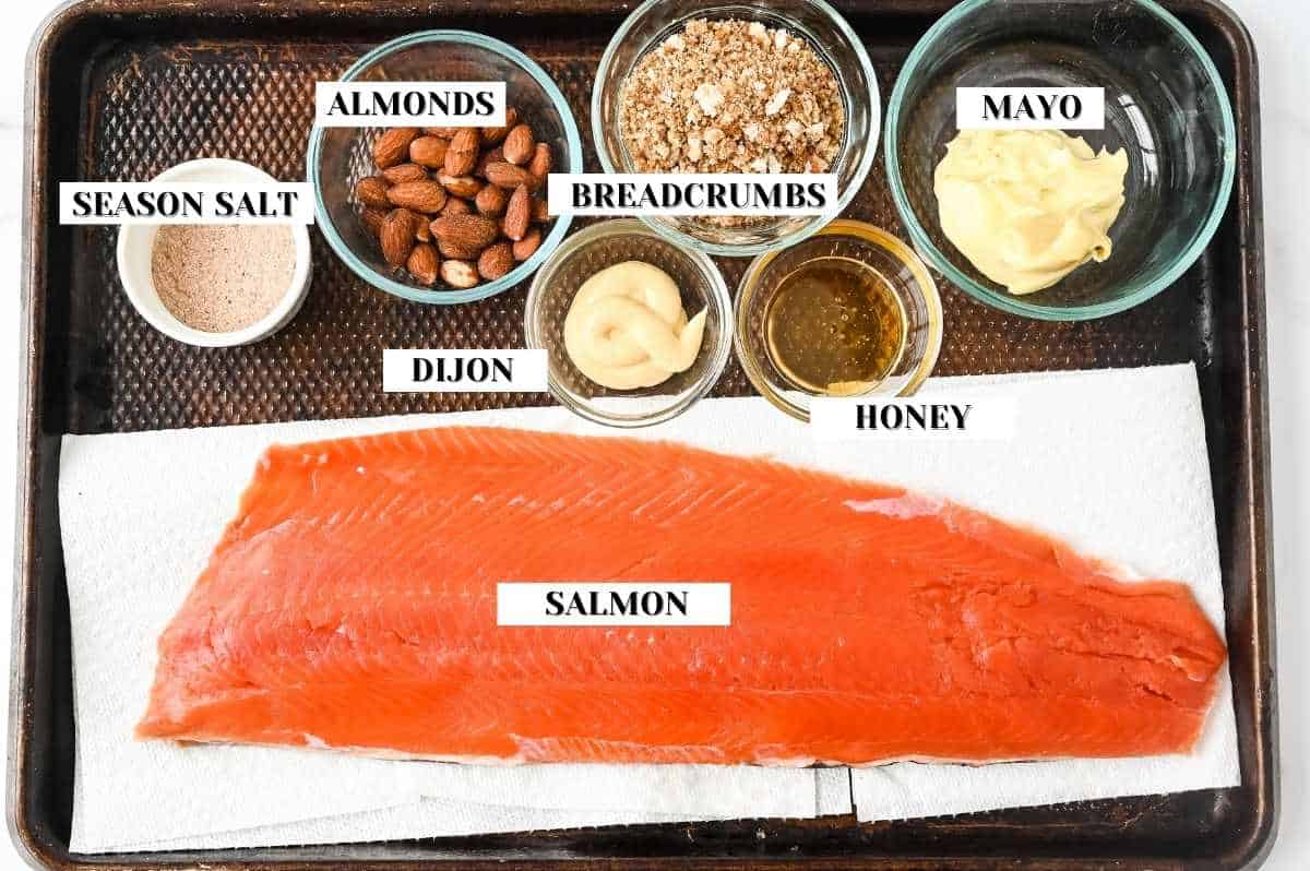 ingredients for this almond crusted salmon on a sheet pan.