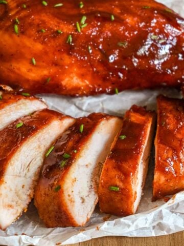 close up of smoked chicken slices.