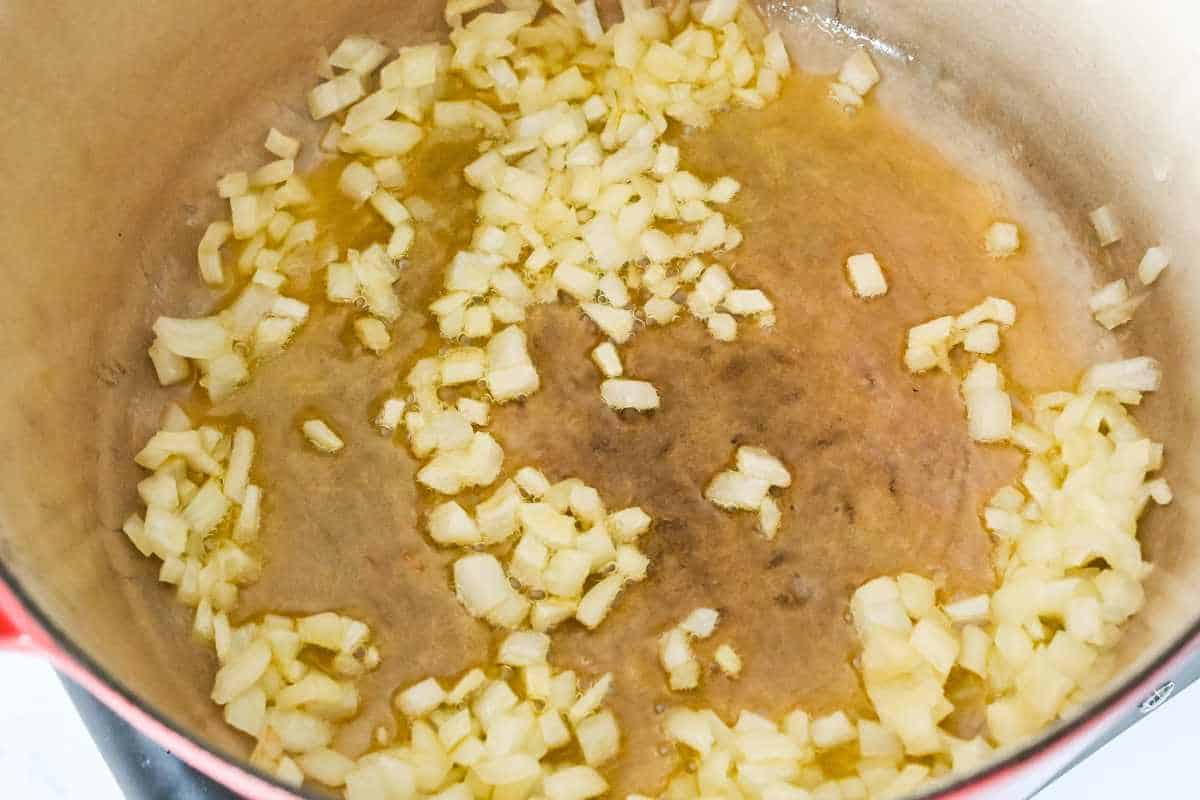 onions cooking in a pan.