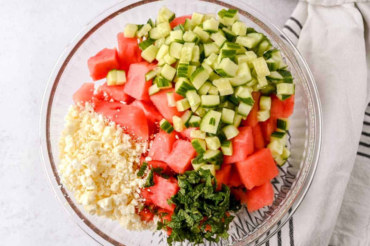 salad ingredients in a glass bowl.