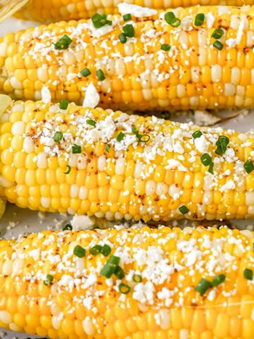 3 ears of pellet grilled corn topped with chili lime butter, cheese, and chives.