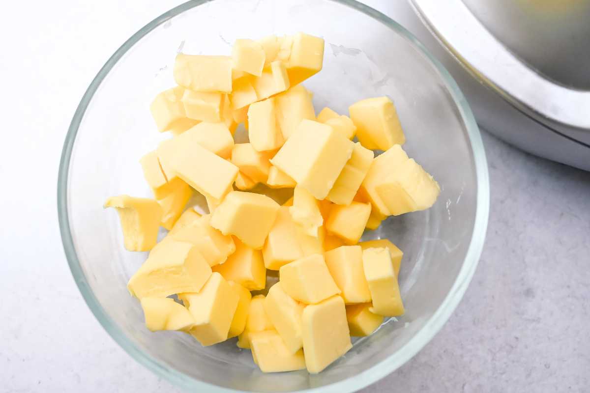 cold cubed butter in a glass dish.
