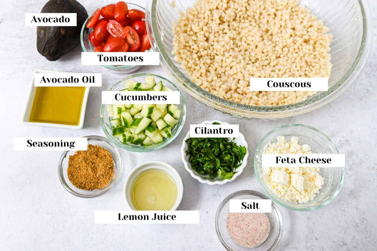 labeled ingredients for making avocado couscous salad.