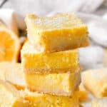 close up stack of meyer lemon bars.