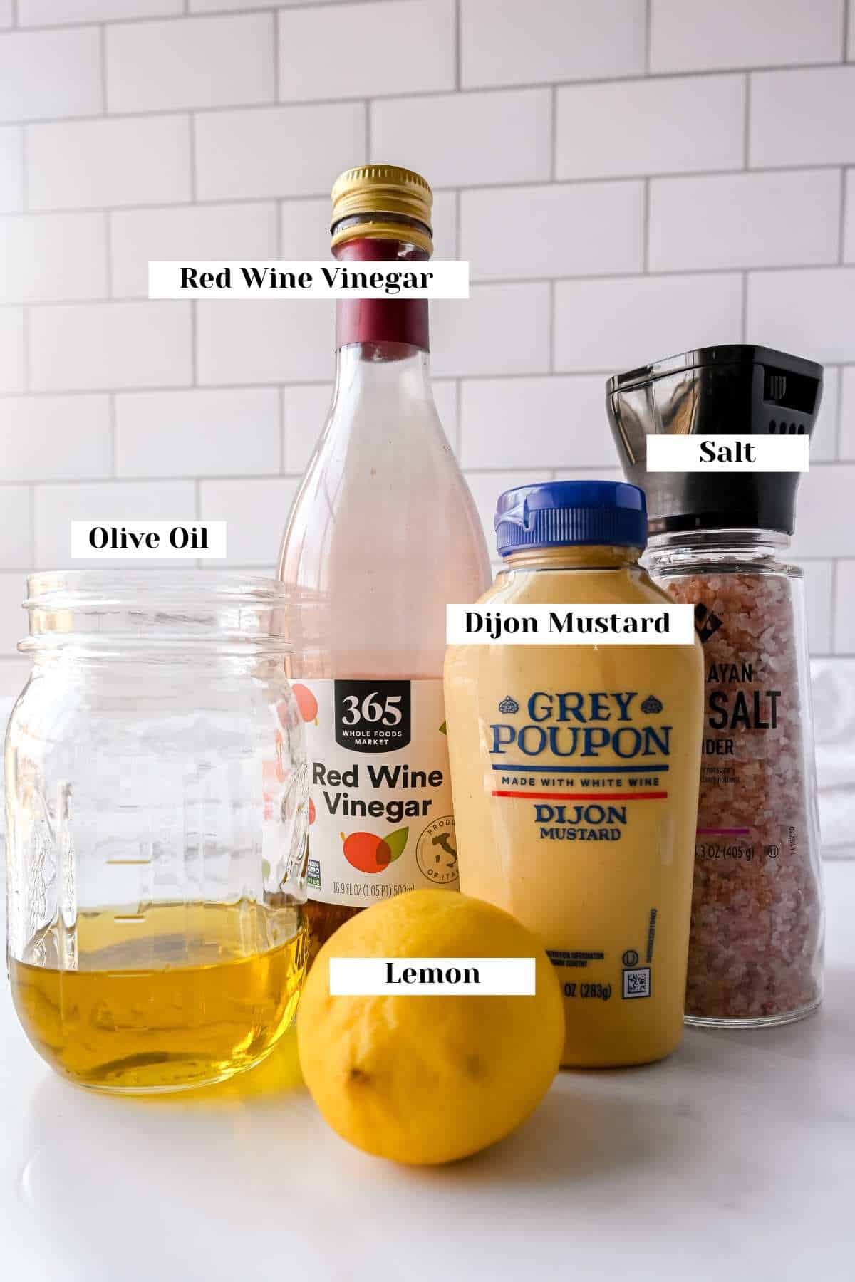 labeled ingredients for making homemade red wine vinaigrette.