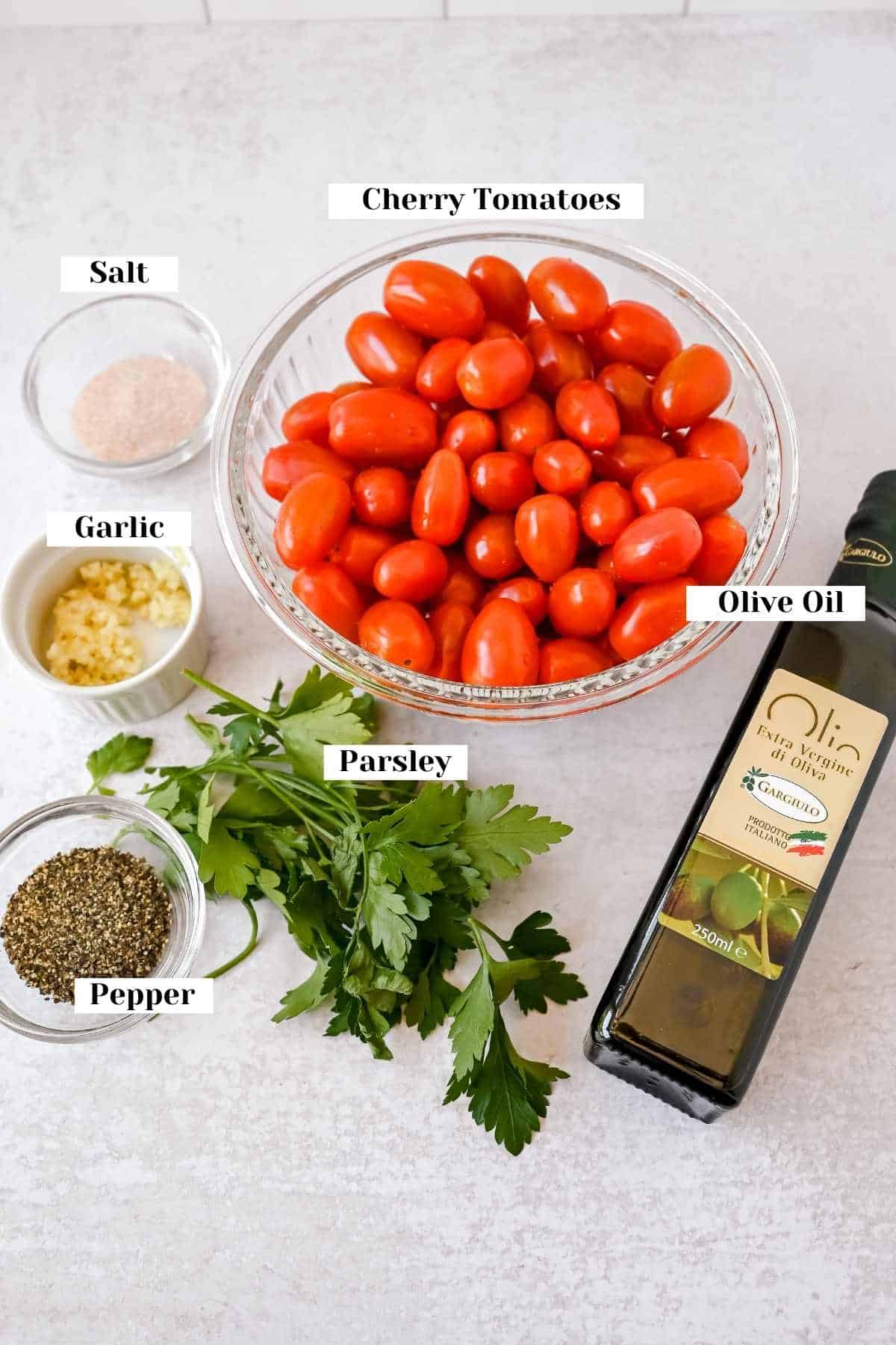 labeled ingredients for making cherry tomato pasta.