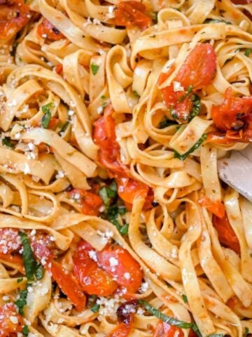 close up shot of cherry tomato pasta.