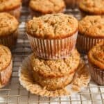 featured photo showing close up of a stack of gluten-free almond flour zucchini muffins.