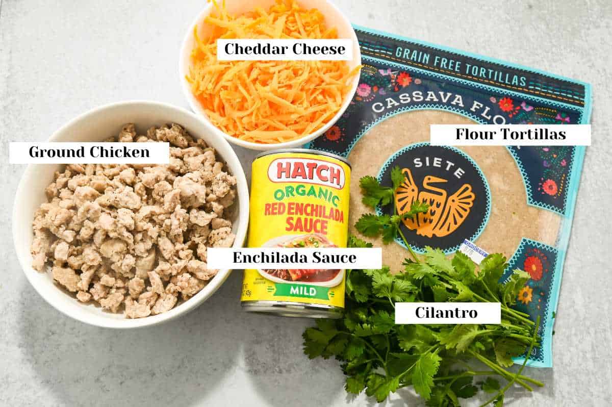 labeled ingredients for ground chicken enchiladas.