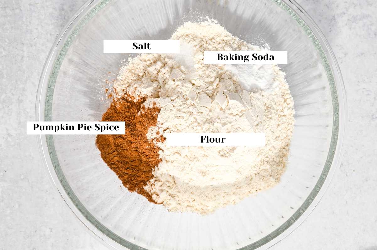 labeled dry ingredients for making pumpkin walnut bread.