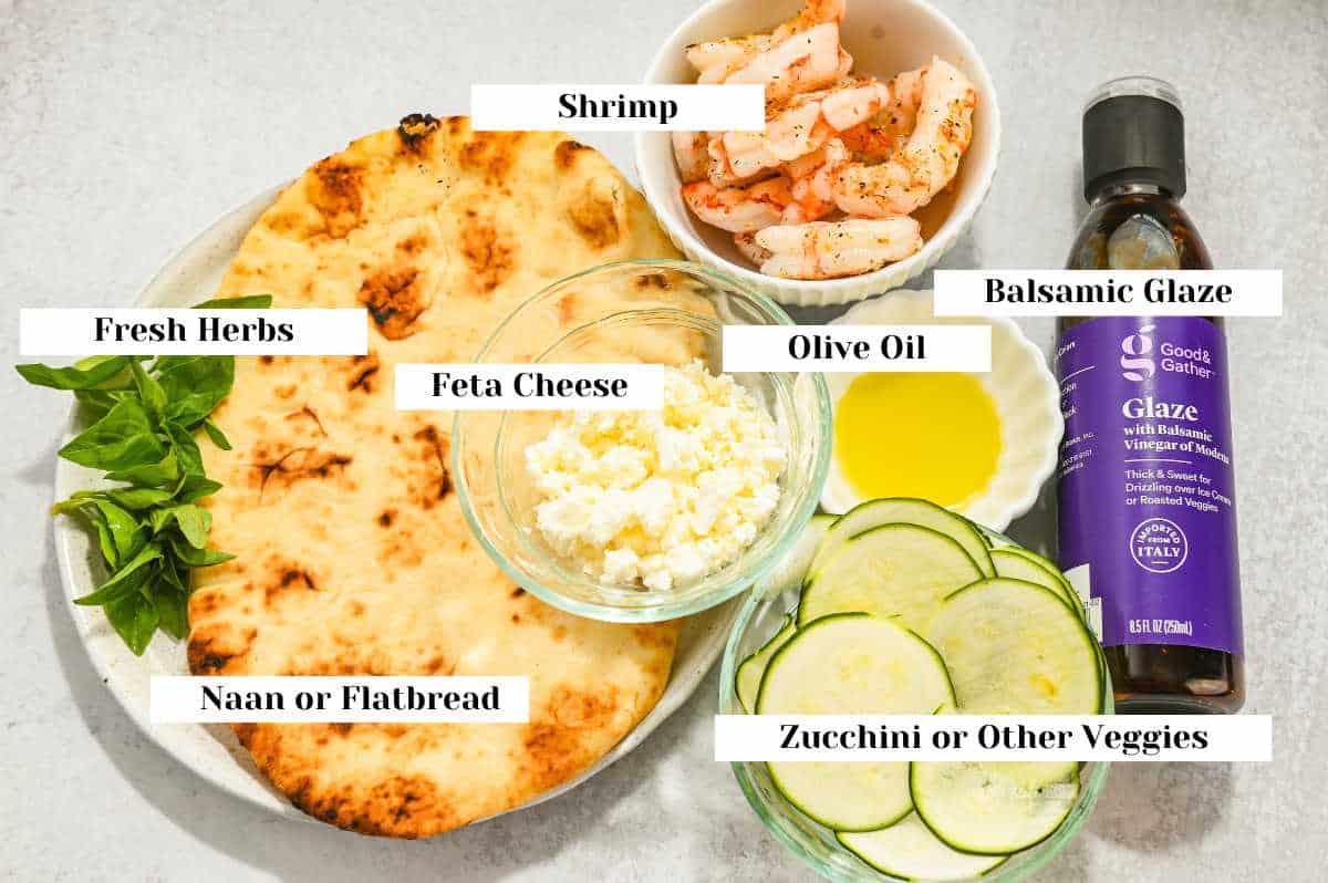 labeled ingredients for making shrimp pizza.