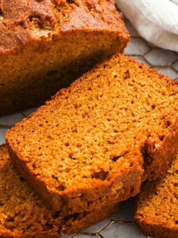 close up of a slice of eggless pumpkin bread.