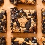 close up of oreo brookies on brown parchment paper.