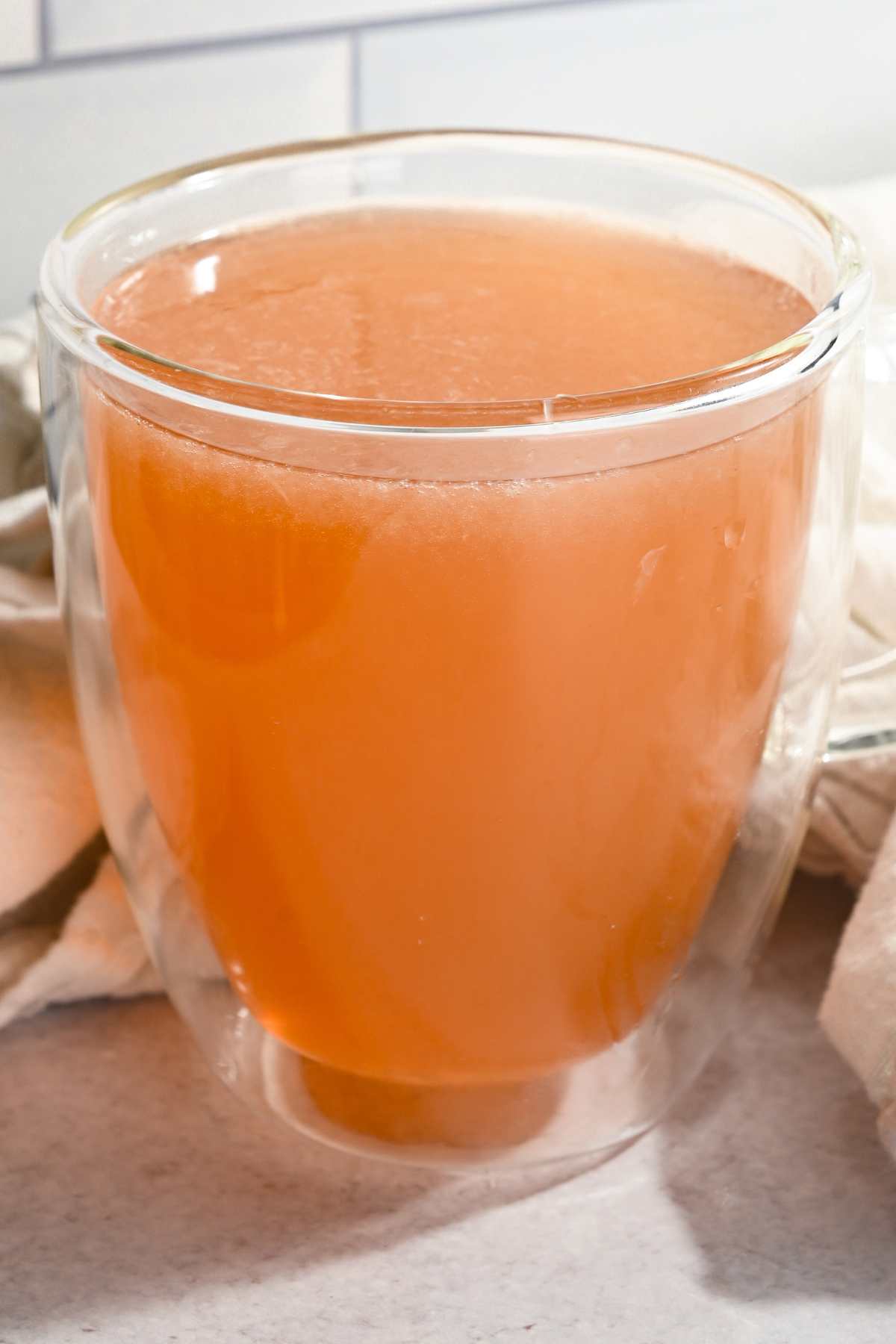 close up of Starbucks inspired medicine ball tea in a glass cup.