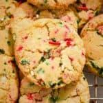 close up shot of one sugar cookie with christmas sprinkles.