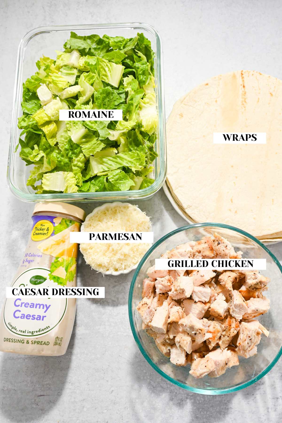 ingredients for making grilled chicken caesar wraps.