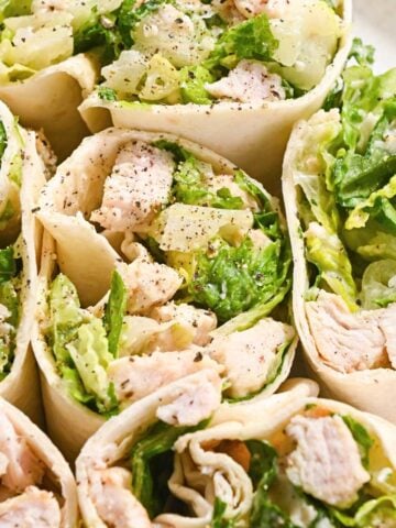 close up of grilled chicken caesar wraps.