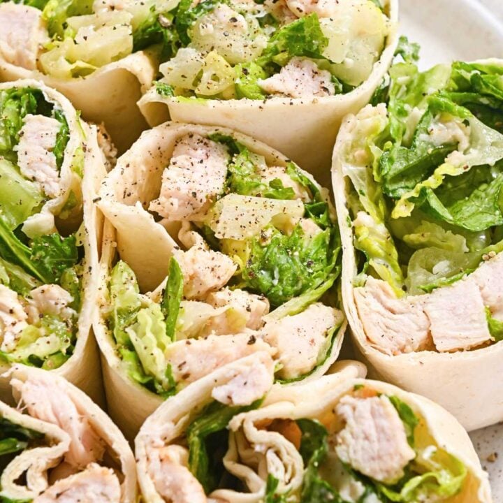close up of grilled chicken caesar wraps.