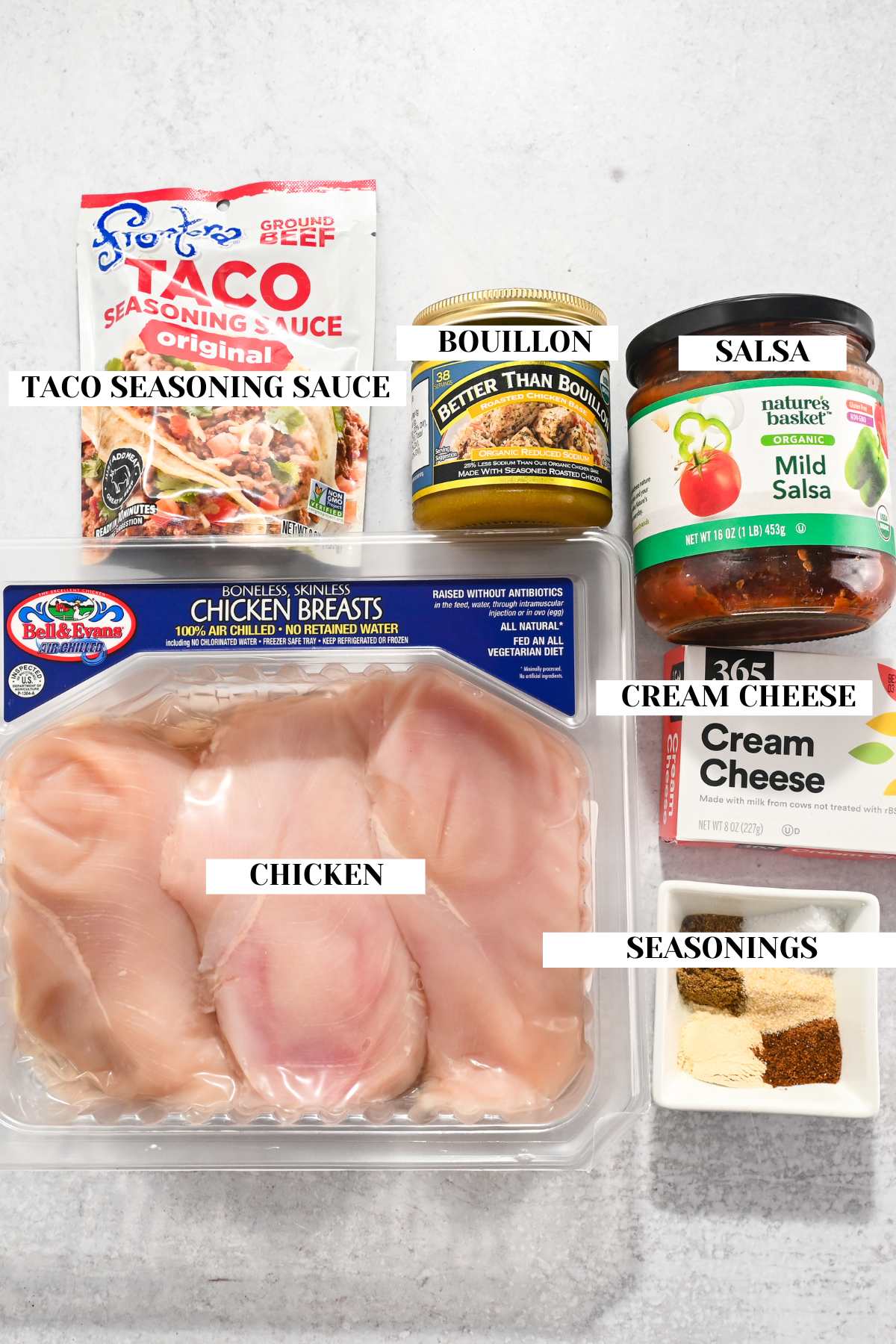 labeled ingredients for making creamy chicken taco soup.