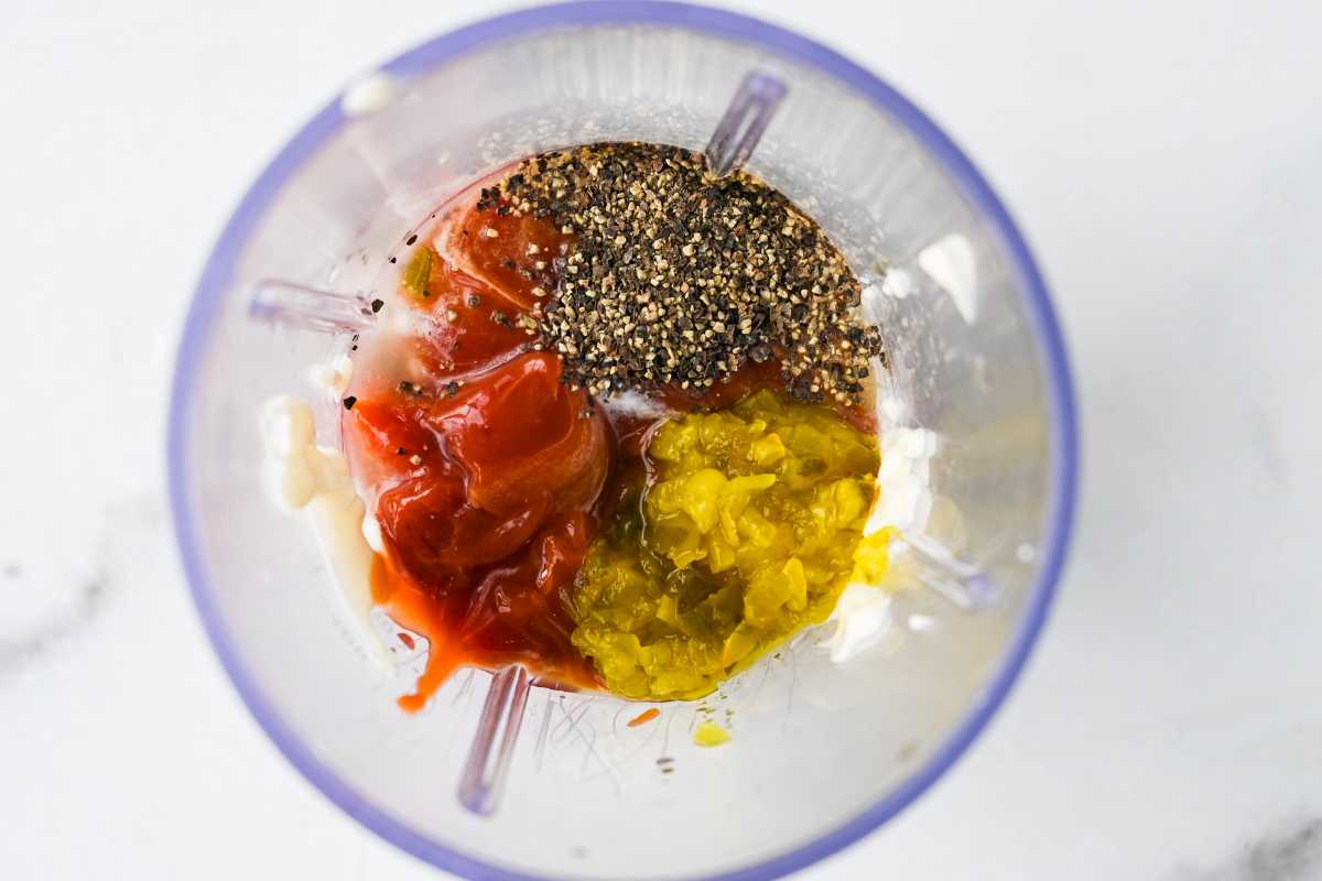 Homemade burger sauce ingredients in a blender before blending.