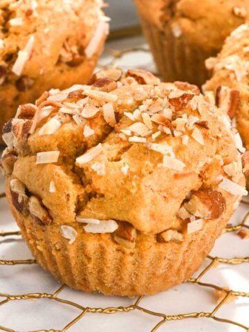 close up of one protein carrot cake muffin.